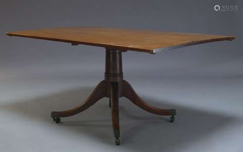 A mahogany breakfast table, 19th Century and later, the rectangular associated top, on tapering