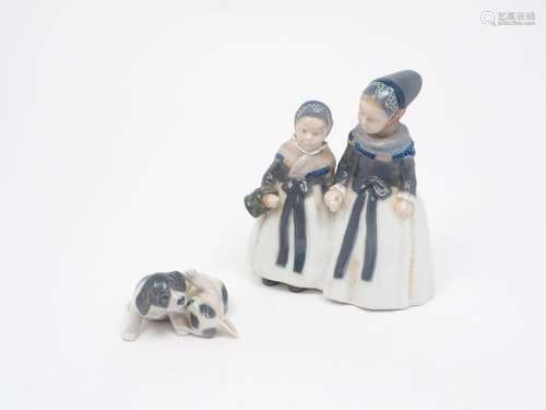 A Royal Copenhagen figure group of two young girls holding hands, printed mark to base with