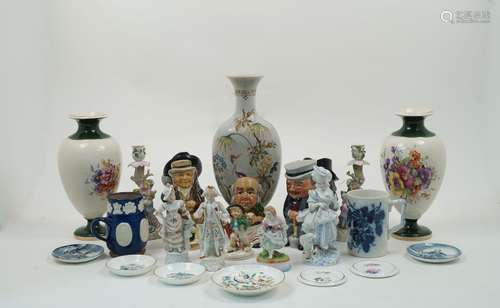 A collection of five Staffordshire Toby Jugs of varying subjects, the tallest 19cm high, together