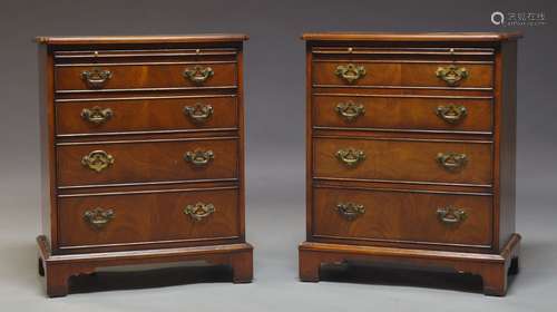 A pair of George III style mahogany bachelor's chests, late 20th Century, the crossbanded