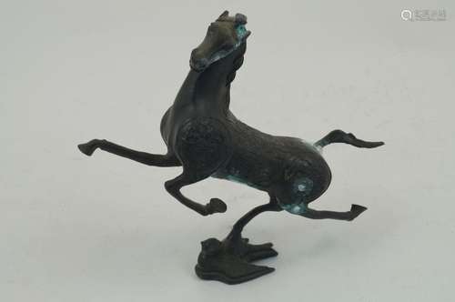 A Chinese bronze figure of a horse, 20th century, modelled rearing, atop a stylized bird form