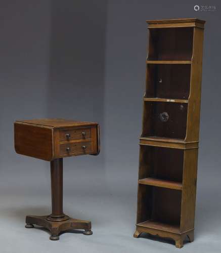 A Regency mahogany drop leaf side table, with two opposing drawers and two opposing faux drawers, on