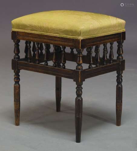 A late Victorian stained beech stool, the rectangular seat upholstered in green patterned fabric,