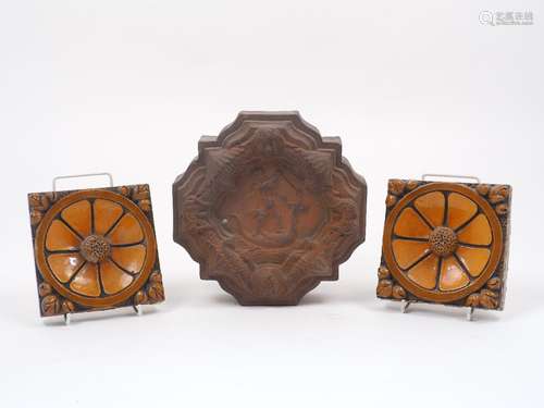 An early Victorian terracotta architectural wall boss of quatrefoil form, the centre shallow