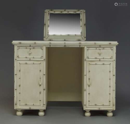 A white painted, faux bamboo and marble topped knee hole dressing table, late 20th Century, with