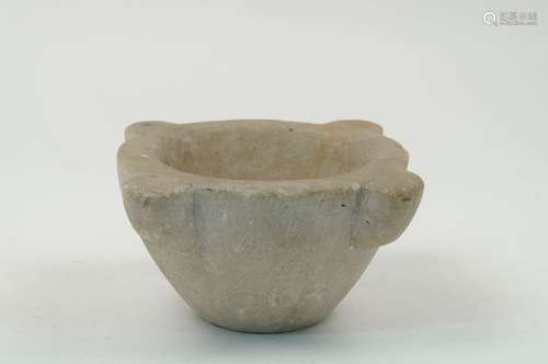 A marble mortar, 20th century, of tapering circular form, with four crescent lugs, 13.5cm x 29.