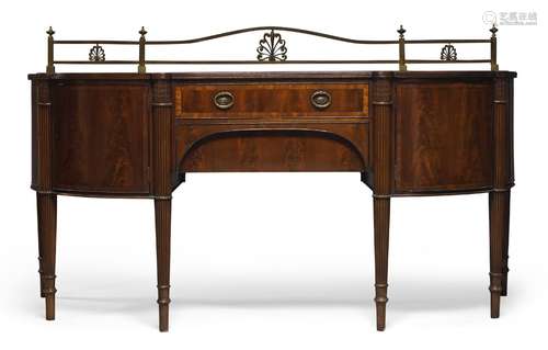 A Regency style mahogany and crossbanded sideboard, early 20th Century, the top with brass gallery