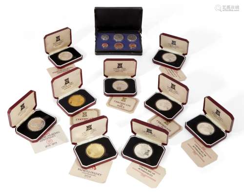 A collection of nine commemorative proof crowns, comprising: crowns - two silver gilt, the Queen's
