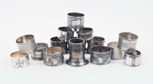 A group of seven various French silver napkin rings, together with a Norwegian silver example,
