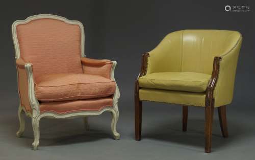 A Louis XV style white painted bergere armchair, second half 20th Century, upholstered in salmon