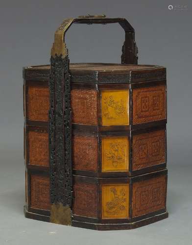 A Chinese wedding basket, late 19th/early 20th century, of typical tiered form, designed with