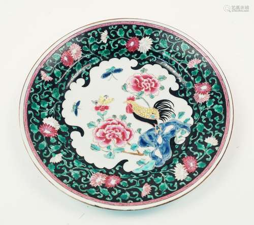 A Chinese porcelain dish, 20th century, painted in famille rose enamels with a cockerel standing