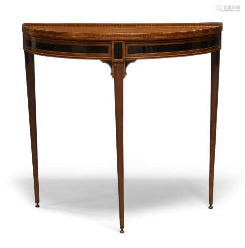 An Italian satinwood and ebonised demi lune side table, 18th Century, the galleried top with