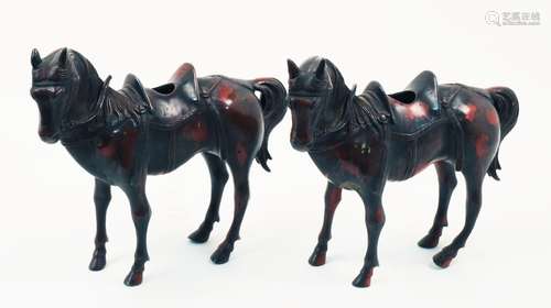 A pair of Chinese bronze 'horse' incense burners, late 19th century, cast standing upright with