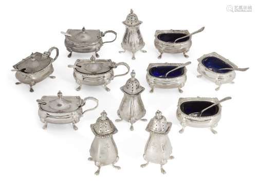 A matched set of silver cruets, comprising four each peppers, salts and mustard pots, various