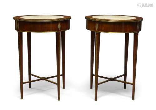 A pair of Russian mahogany and brass mounted gueridons, late 19th Century, the circular tops inset