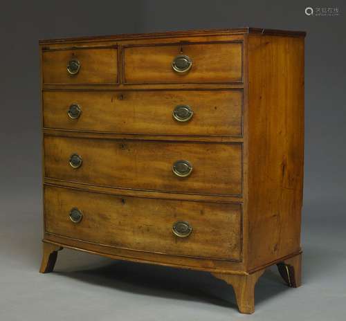 A Regency mahogany bowfront chest of drawers, with two short over three long graduated drawers,