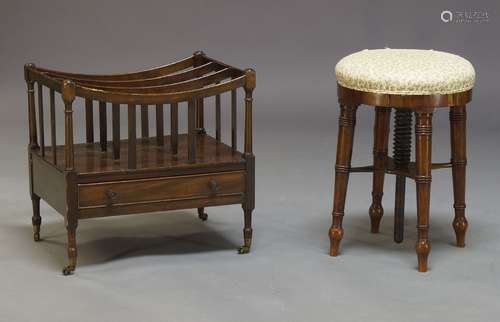 An Edwardian mahogany Canterbury, with three divisions, above single frieze drawer, on cylindrical