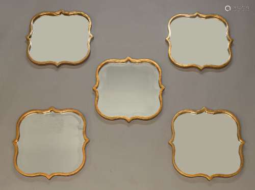 A set of five surtout de table mirrors, 20th Century, each of quatrefoil form, with bevelled