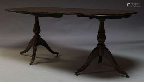 A George III style mahogany extending D-end dining table, late 20th Century, the crossbanded top