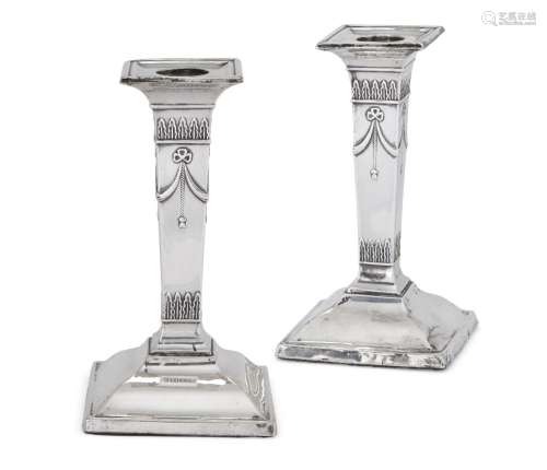 A pair of silver candlesticks, Sheffield, c.1910, Fordham & Faulkner, of short, columnar form, the