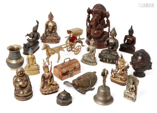 A group of Buddhist and Hindu figurines in bronze, wood and other metals, including a larger wood