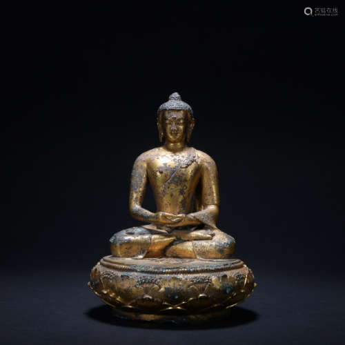 A gilt-bronze statue of Shakya Mani