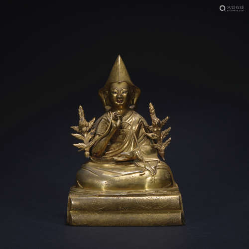 A gilt-bronze statue of Tsongkhapa