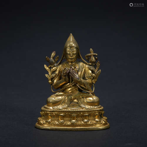 A gilt-bronze statue of Tsongkhapa