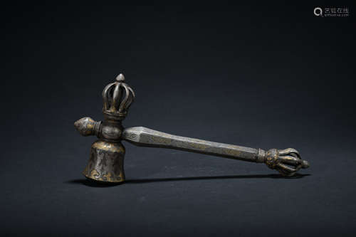 A bronze hammer inlaid with gold and silver