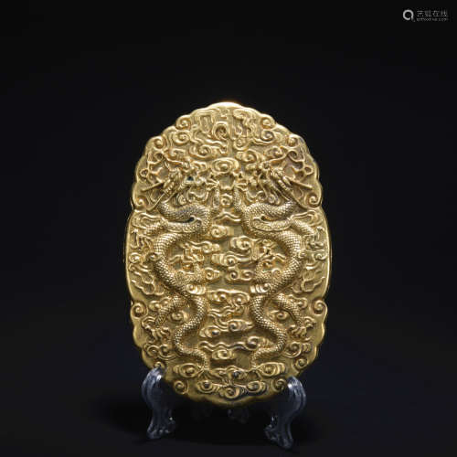 A gilt-bronze 'dragon' card