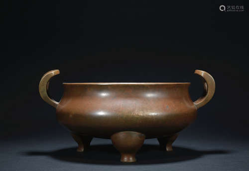 A bronze incense burner