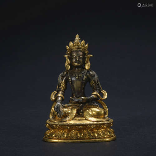 A gilt-bronze statue of Avalokiteshvara