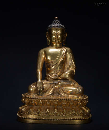 A gilt-bronze figure of shakyamuni
