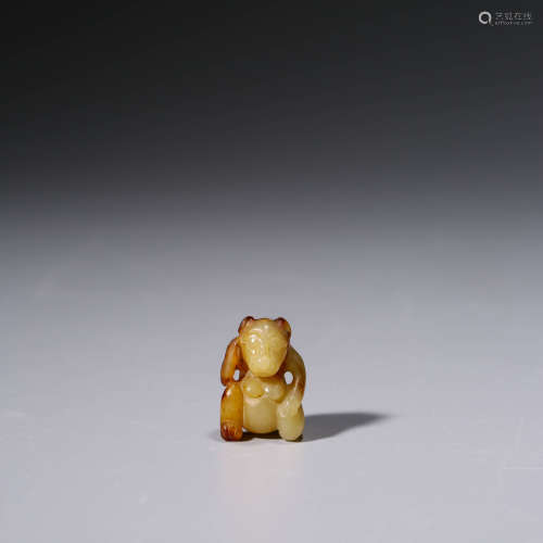 AN ARCHIASTIC CHINESE YELLOW JADE BEAR