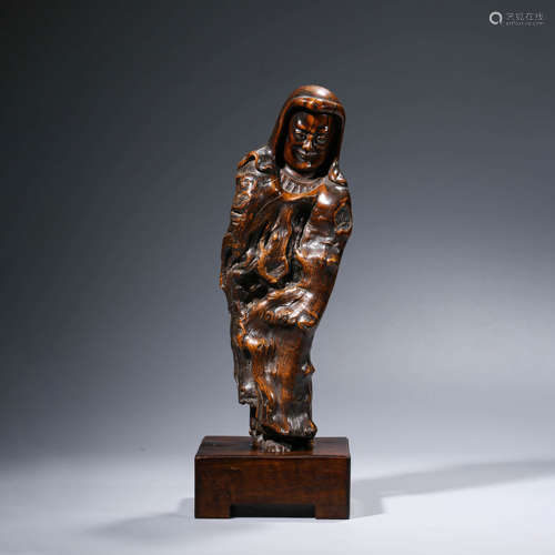 A CHINESE REDWOOD FIGURE CARVING