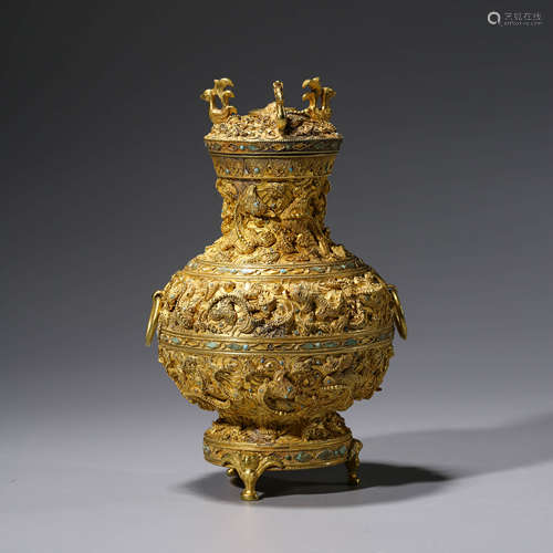 A CHINESE SIVLER GILDING VASE AND COVER