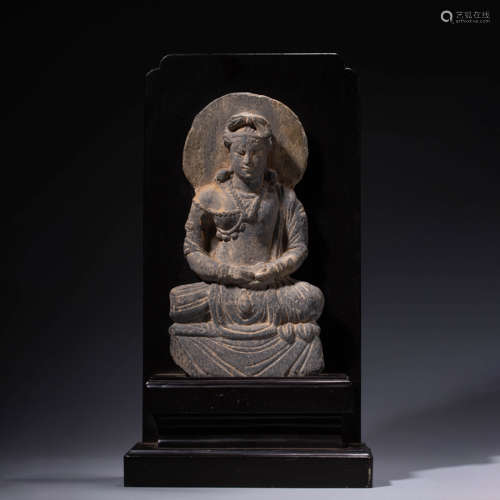 A CHINESE STONE CARVING OF GANDHARA STAUTE