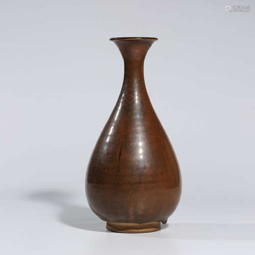 A CHINESE IRON-RED-GLAZED PORCELAIN VASE