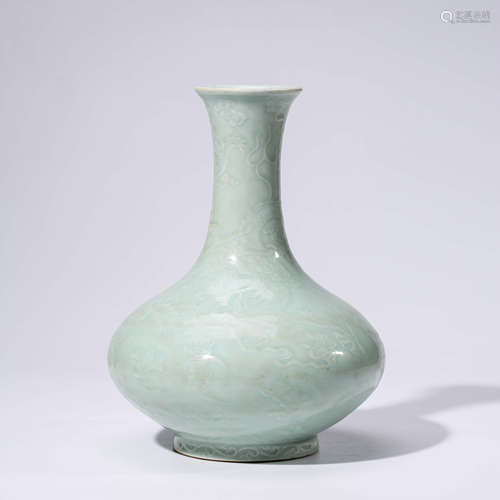 A CHINESE CELADON-GLAZED DRAGON VASE MARKED QIAN LONG