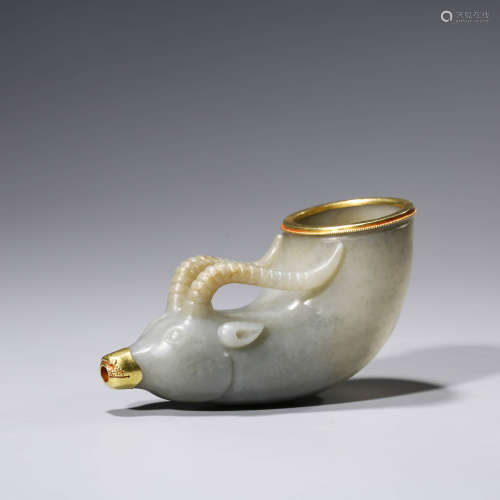 A CHINESE WHITE JADE CATTLE HEAD WINE VESSEL