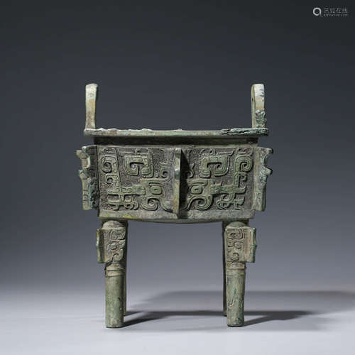 A CHINESE BRONZE TAOTIE MASK STEAMING VESSEL, DING