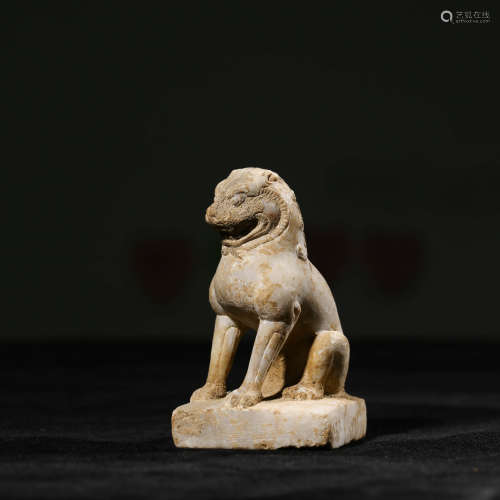 A CHINESE STONE LION AND STAND