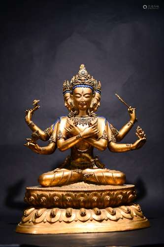 CHINESE GILT BRONZE SEATED SIX ARMED BUDDHA