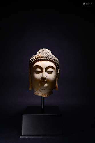 A CHINESE BUDDHA'S HEAD