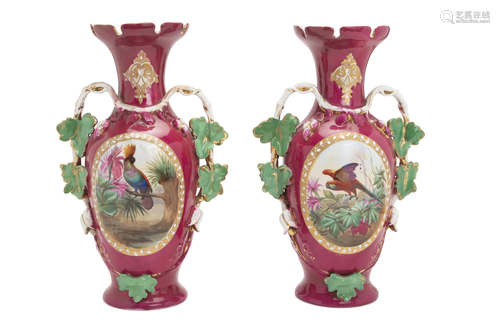 A pair of rouge-painted porcelain vases