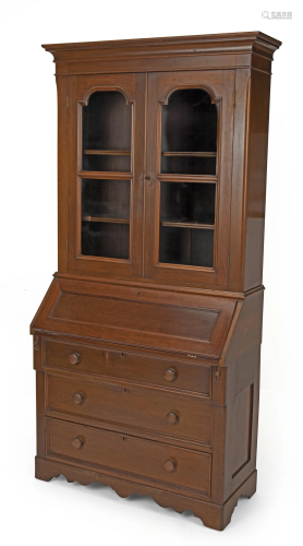 A walnut drop front secretary bookcase