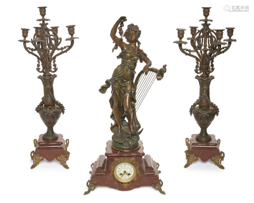 A French mantle clock and garniture set