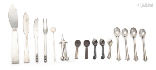 A group of silver table accessories