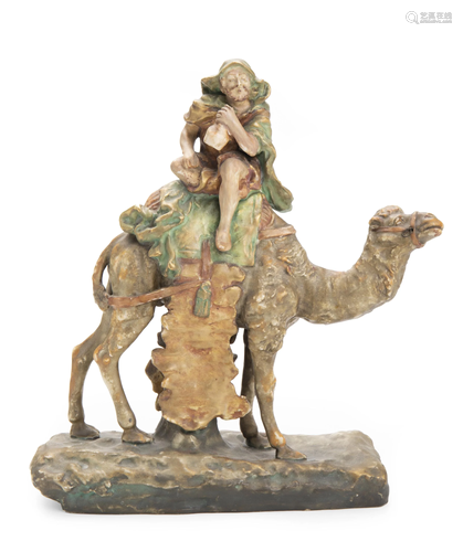 An Amphora figure of a man on a camel